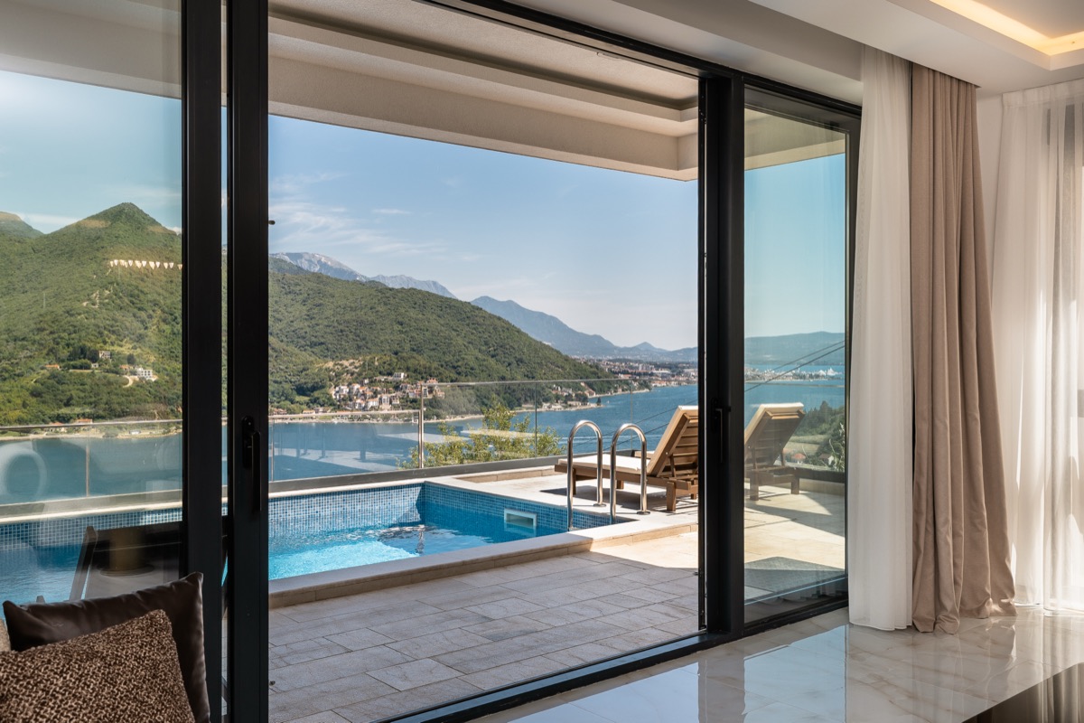 Sliding doors open to the hillside
