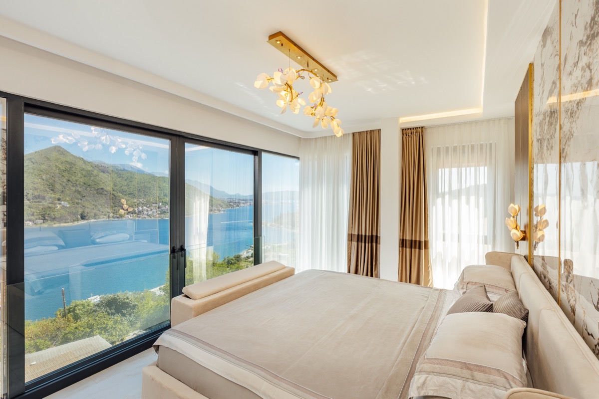 The main bedroom looking out to the mountains